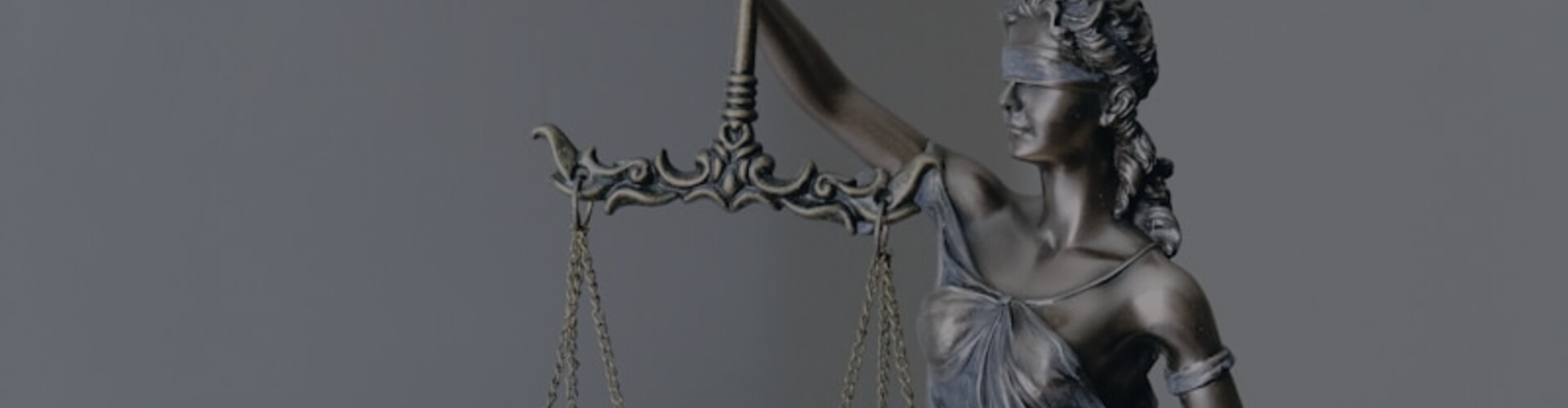 Lady Justice with scales and sword — CognioEnacted maps UK legislation through the seven analytical lenses
